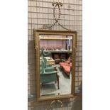 Gilt framed wall mirror with detailed beading,