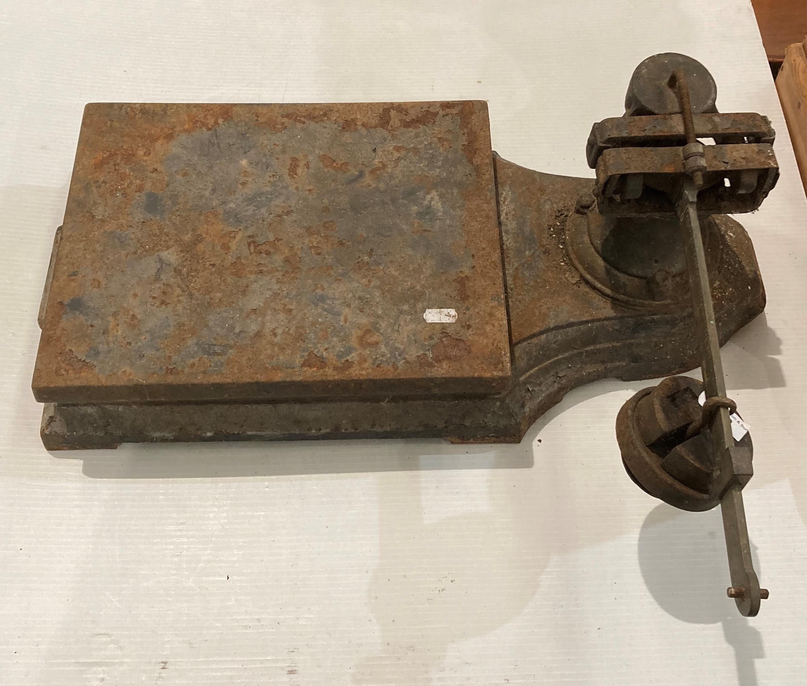 A set of vintage cast metal weighing scales, bed size: 35cm x 27.