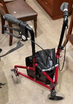 A Drive Devilbiss Health Care Ltd red metal three-wheel folding mobility aid (saleroom location: