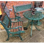 A green metal three-piece garden set comprising bench with wooden slats (130cm),