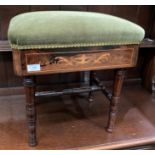 A walnut footstool with marquetry inlay and green upholstered seat with raise and lower mechanism