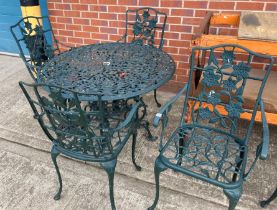 A green painted aluminium garden patio set comprising circular table (100cm diameter) and four