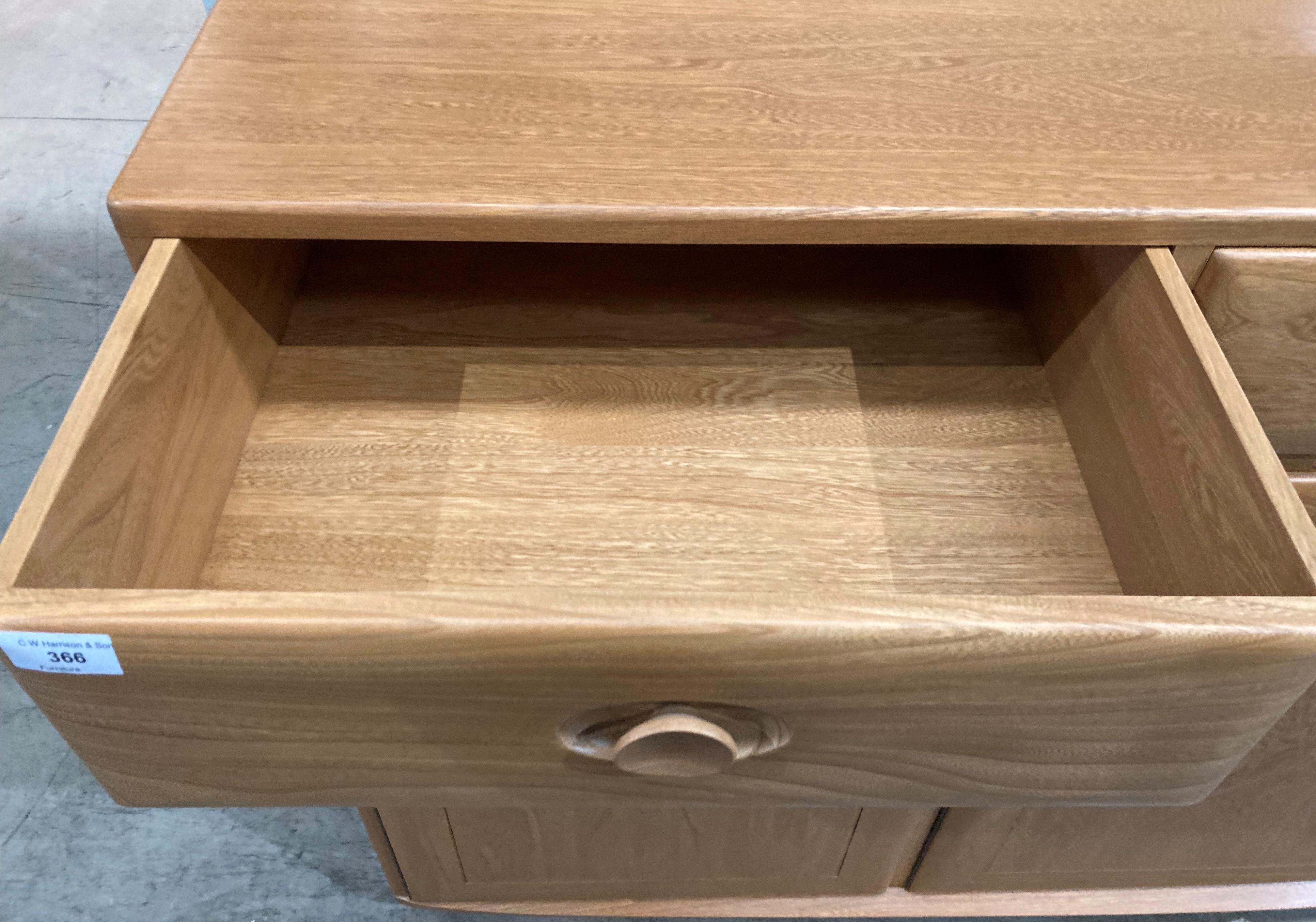 An Ercol blond elm three-drawer, three-door sideboard, - Image 2 of 3