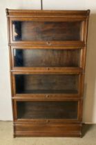 A Mid-Century four-section Globe Wernicke with base section bookcase (no labels),