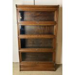 A Mid-Century four-section Globe Wernicke with base section bookcase (no labels),