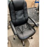 A black leather-effect high-back office swivel armchair on five star chrome base (one arm damaged)