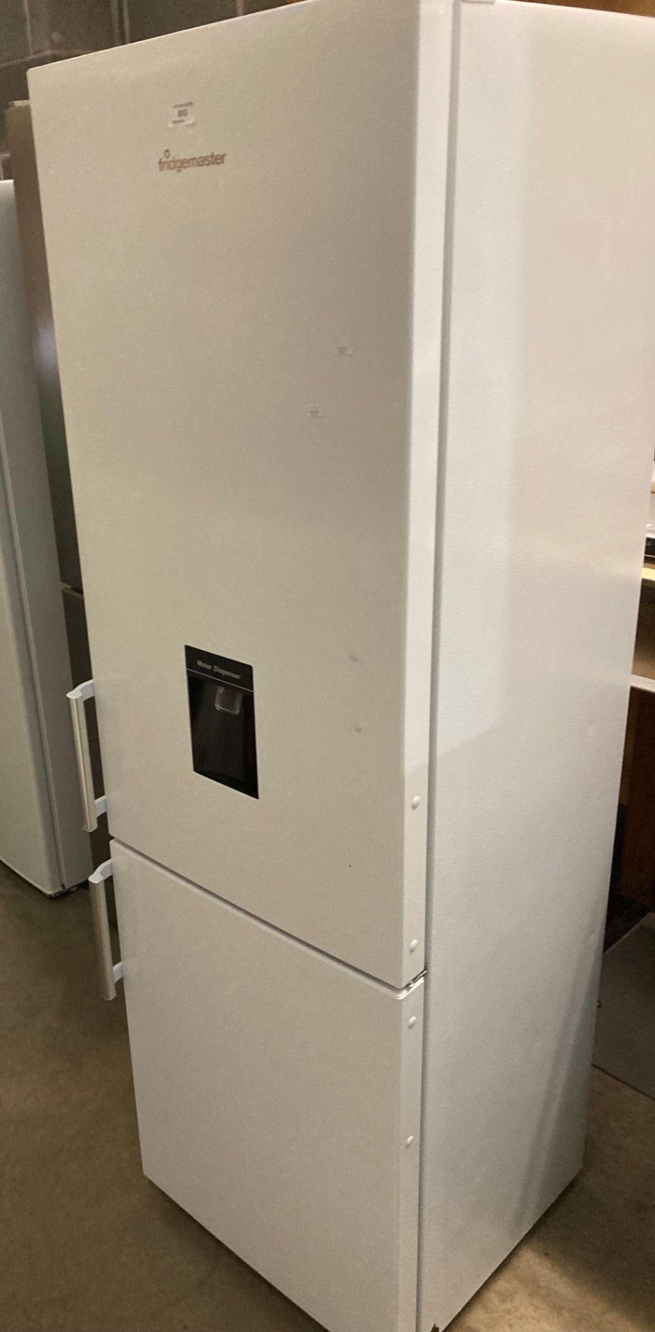Fridgemaster upright fridge freezer (saleroom location: PO)