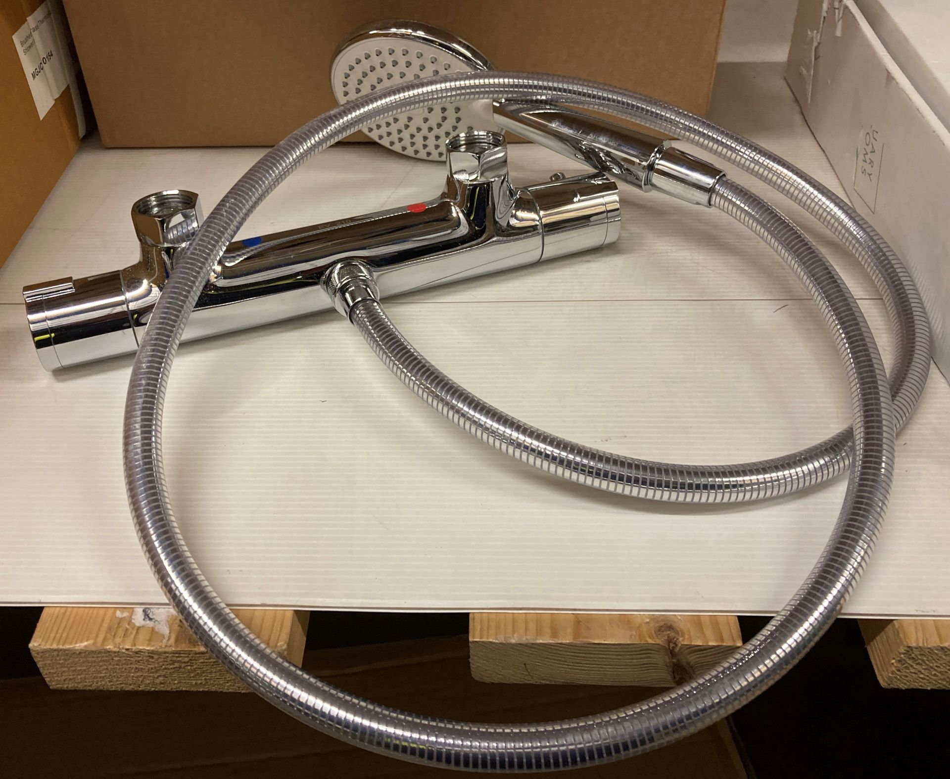 Chrome thermostatic shower bar valve with hose and shower head (saleroom location: Z08)