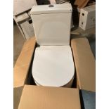 White ceramic close coupled w/c complete with cistern and seat (saleroom location: QL05 FLOOR)