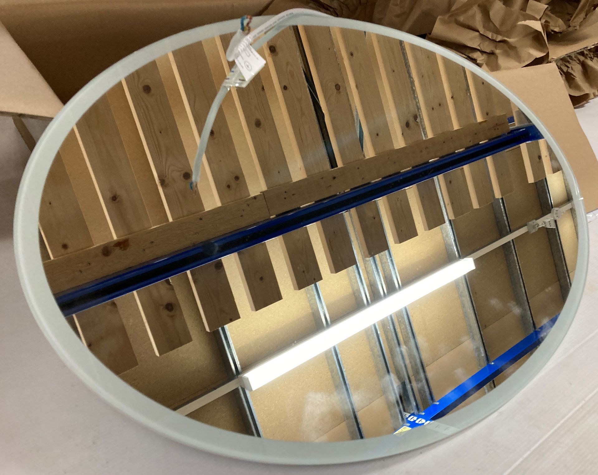 Oval heated wall mirror 270mm x 290mm (saleroom location: R12 FLOOR)