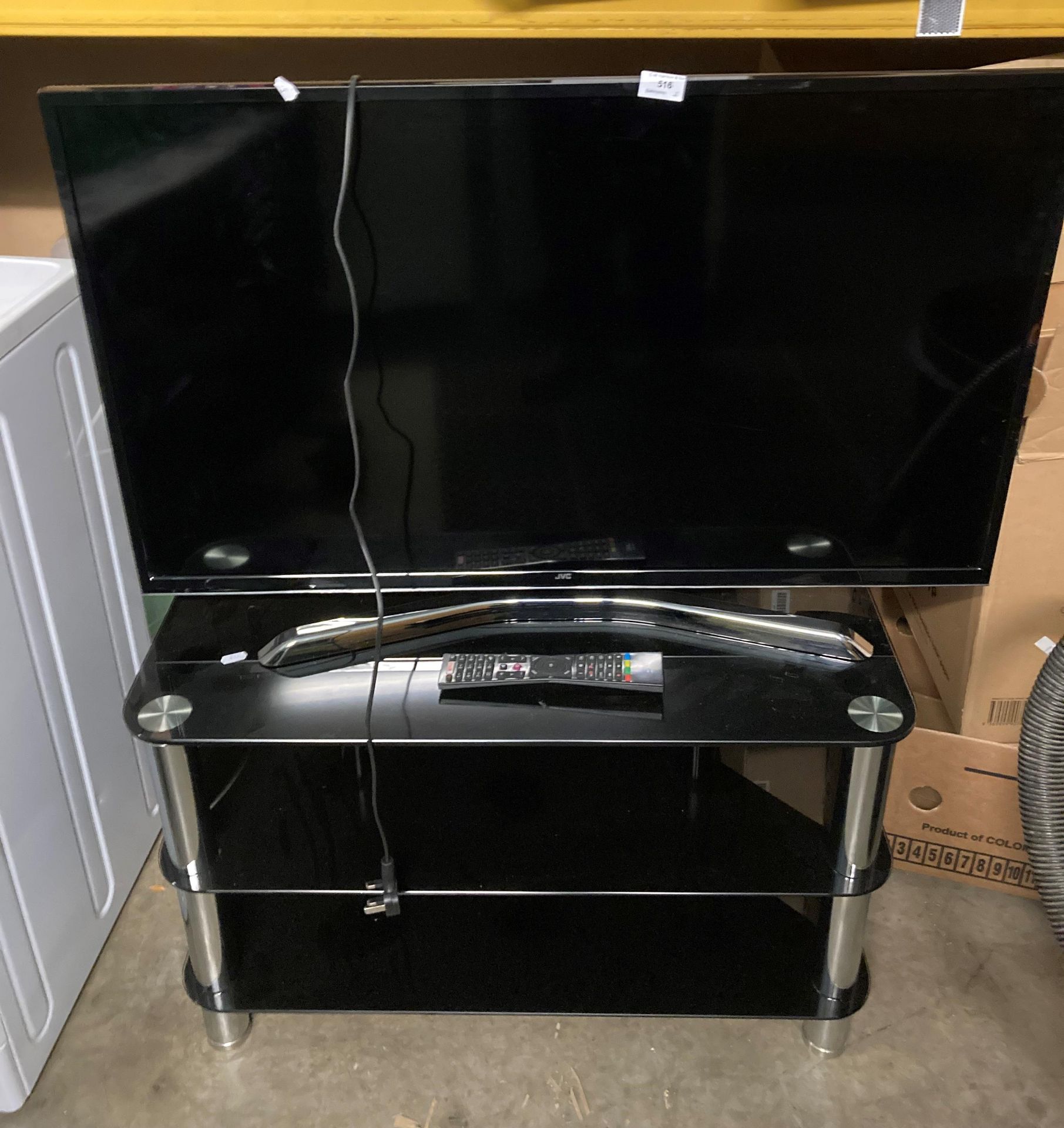 JVC LED Smart 4K HDR TV model LT-40C880 on 3 tier glass stand complete with remote (saleroom