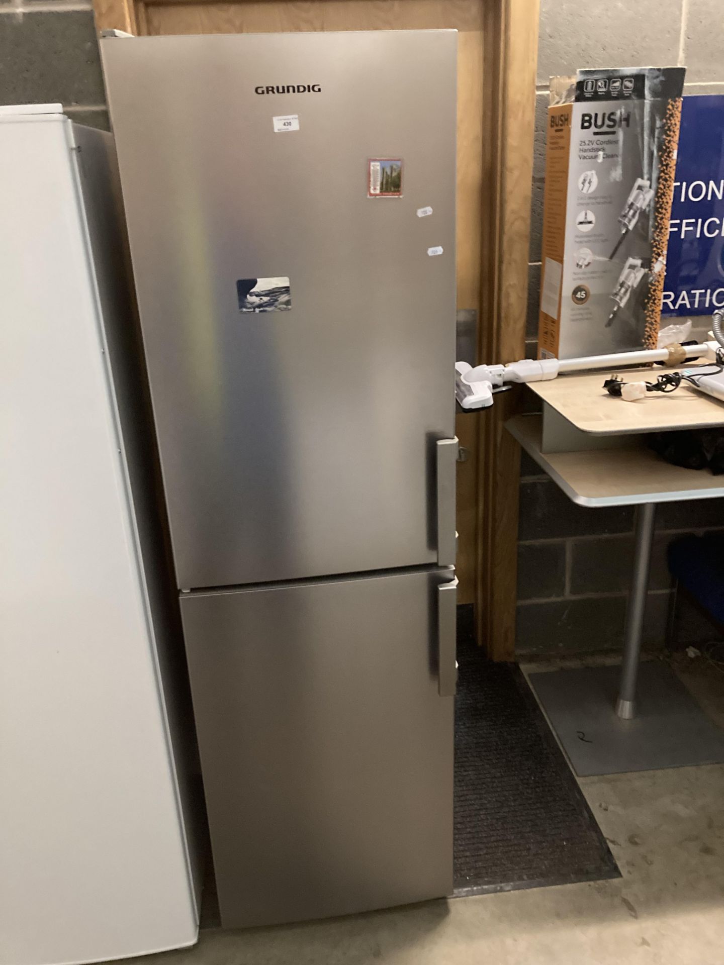 Grundig upright fridge freezer (saleroom location: PO)