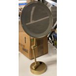 Bango design wall mountable brushed brass round mirror with back light