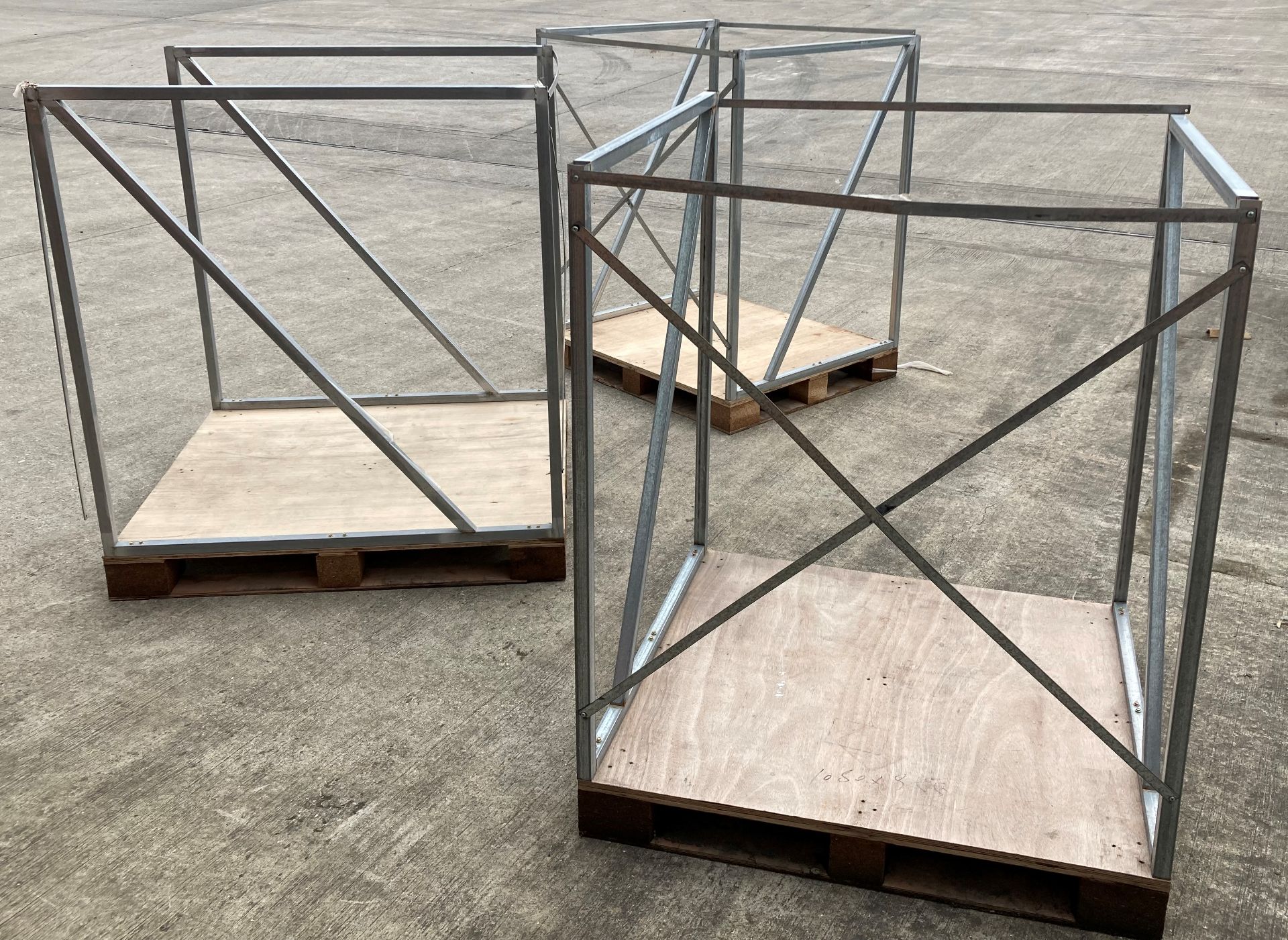 6 x open front metal stillages on pallets (1 larger) (saleroom location: OUTSIDE)