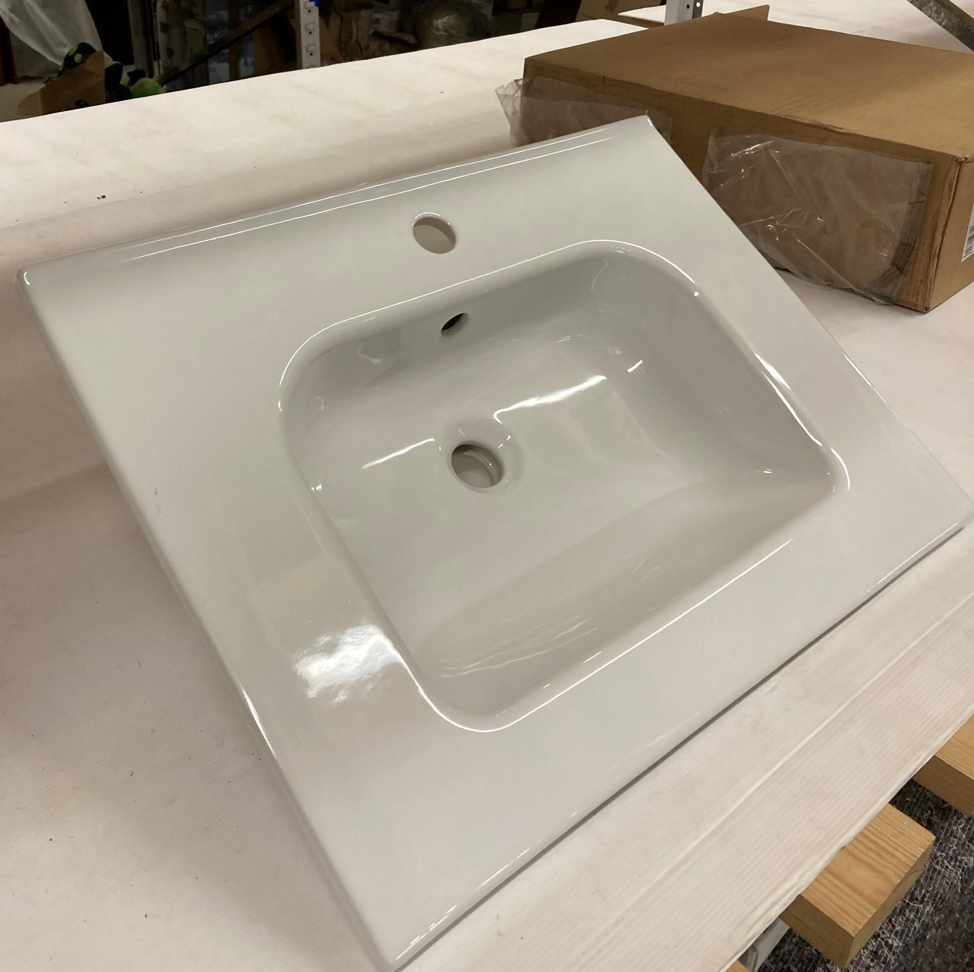 Royo slimline ceramic single tap hole wash basin 60cm x 46cm (saleroom location: R12 FLOOR)