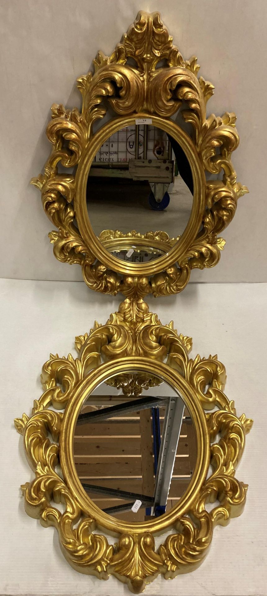 2 x Gilded plastic ornate oval wall mirrors,