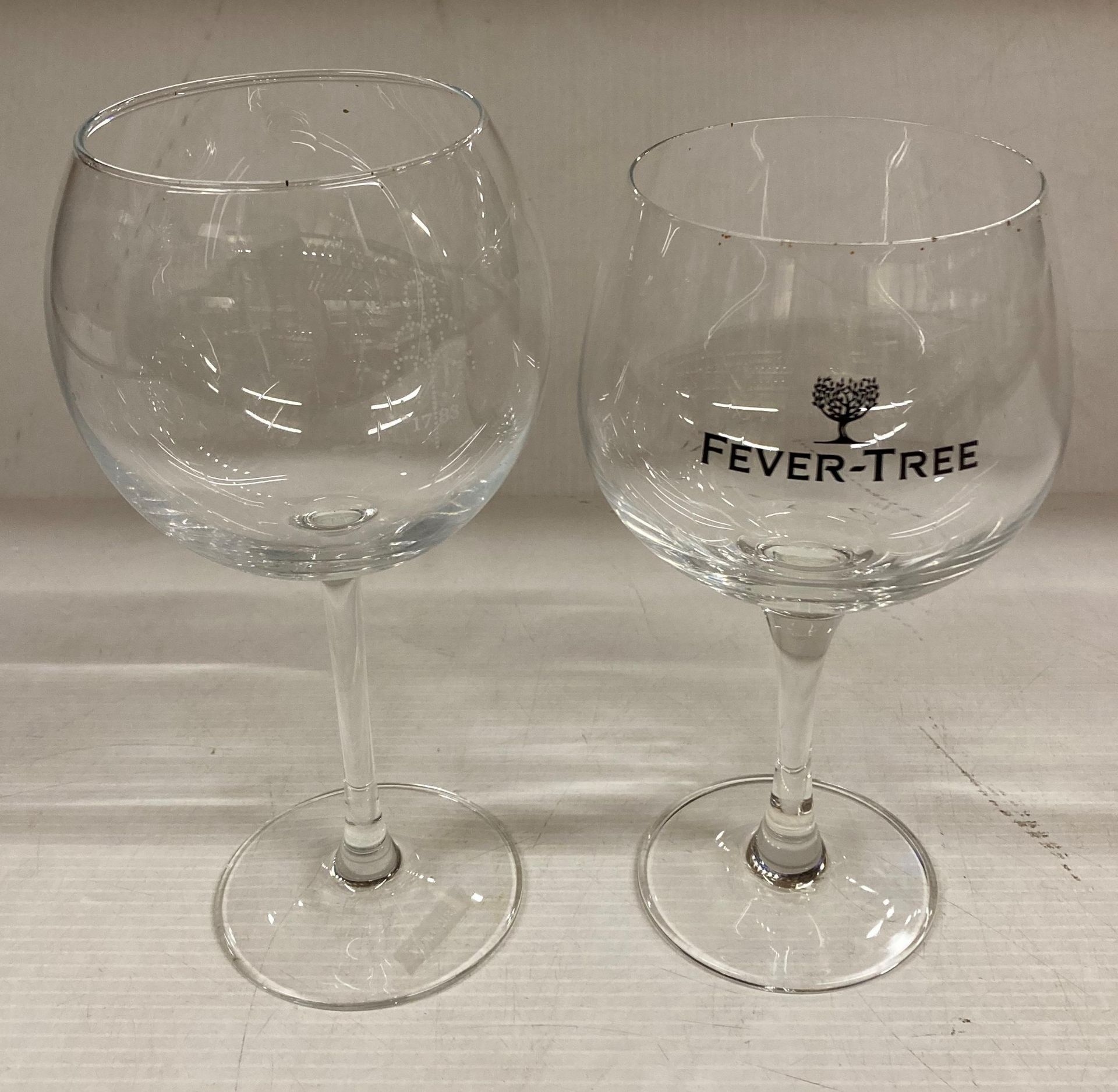 16 x assorted single stem cocktail glasses - some marked 'Fever Tree',