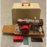 Singer 2016 electric foot-operated sewing machine in carry case (saleroom location: P03-2)