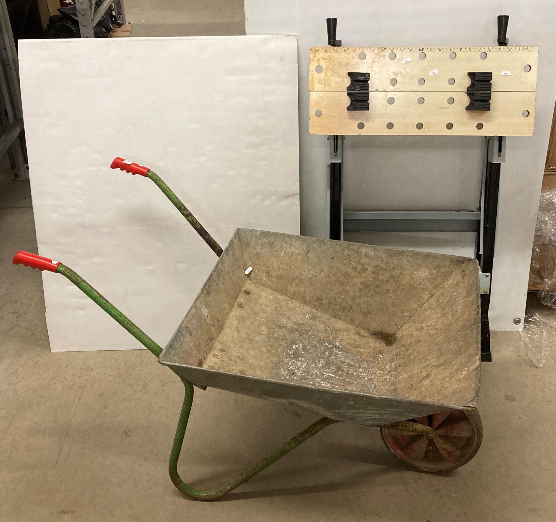 Two items - Power Devil work bench and a galvanized wheel-barrow (saleroom location: N05-1)