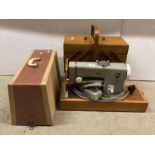 PFAFF 90 electric foot-operated sewing machine in carry case with a wooden multi-compartment sewing