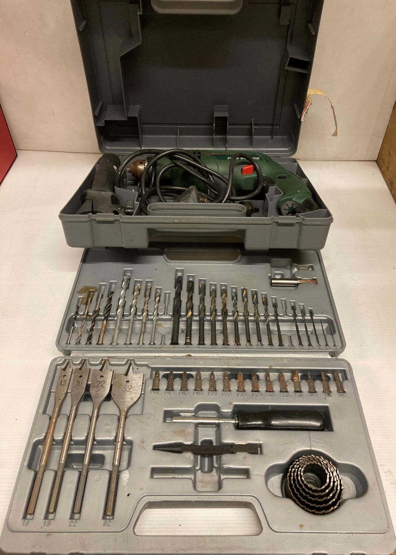 Bosch PSB600RE (240v) hammer-drill in case and a 49-piece Bosch drill bit set in case (saleroom