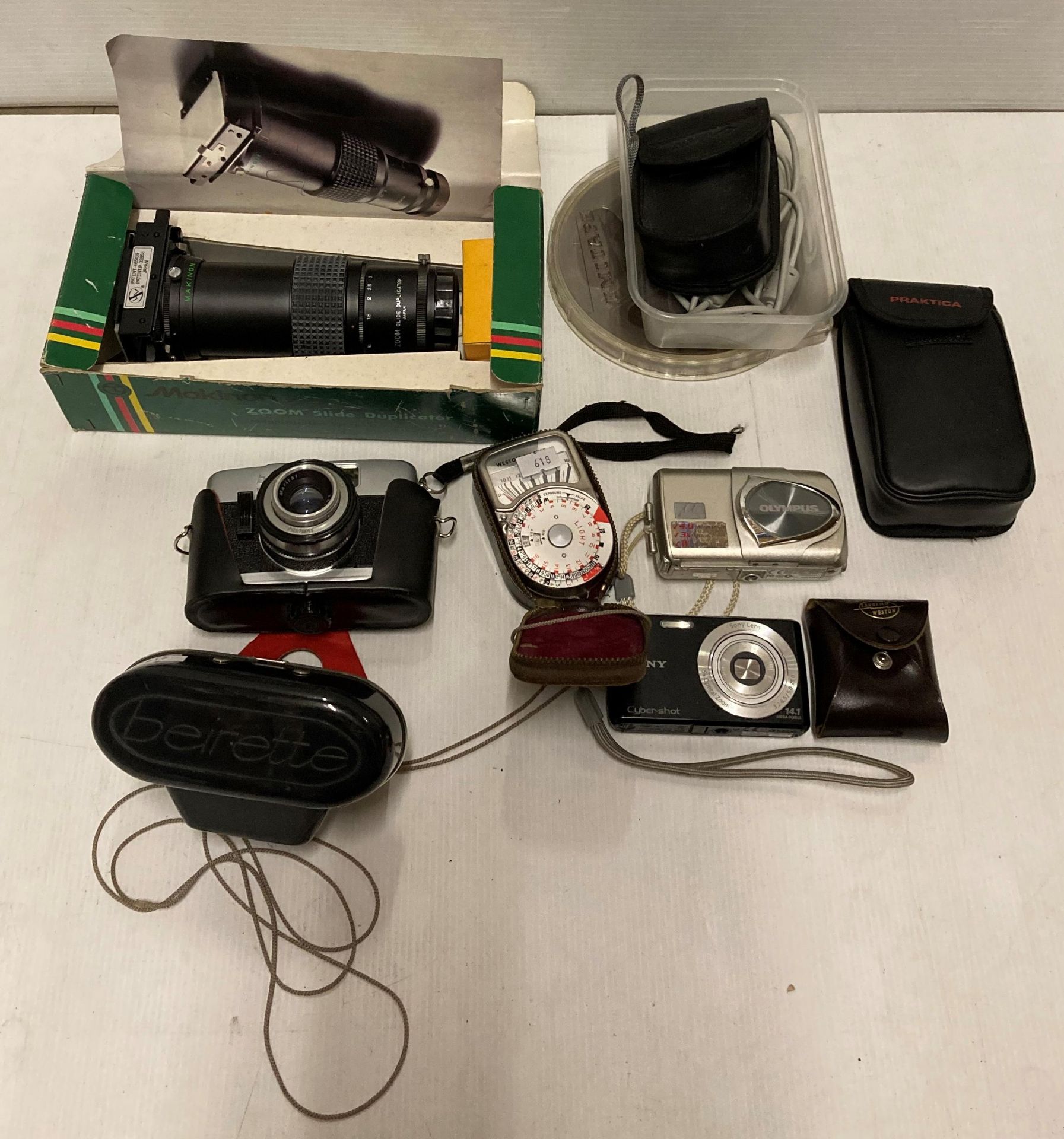 Contents to box - assorted cameras and lenses including Makinon 200m slide duplicator,
