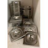 23 x Vogue stainless steel inserts (1/6) with quantity of lids (saleroom location: V01)