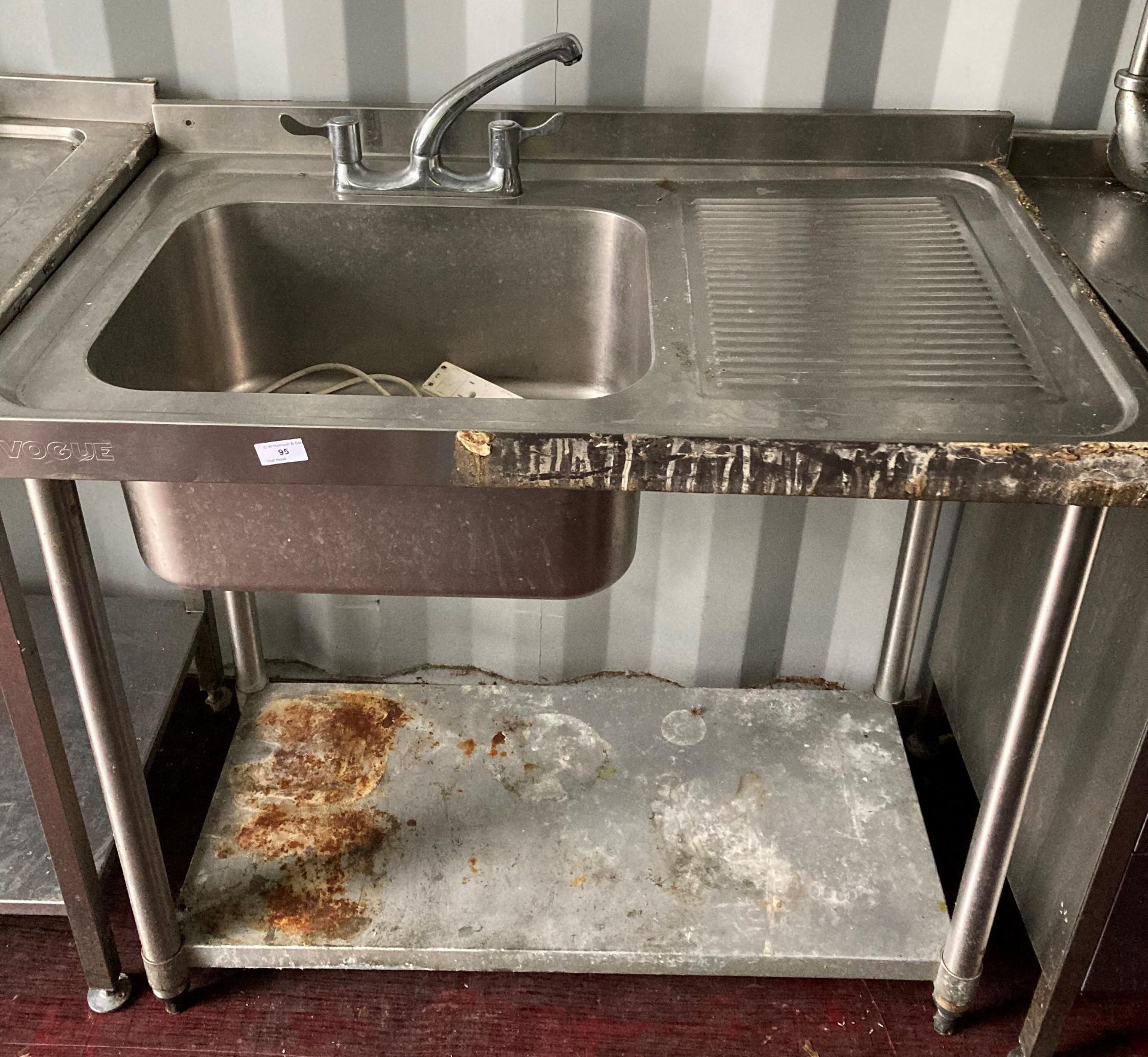 Stainless steel single sink unit with right hand drainer, mixer tap and under-shelf,