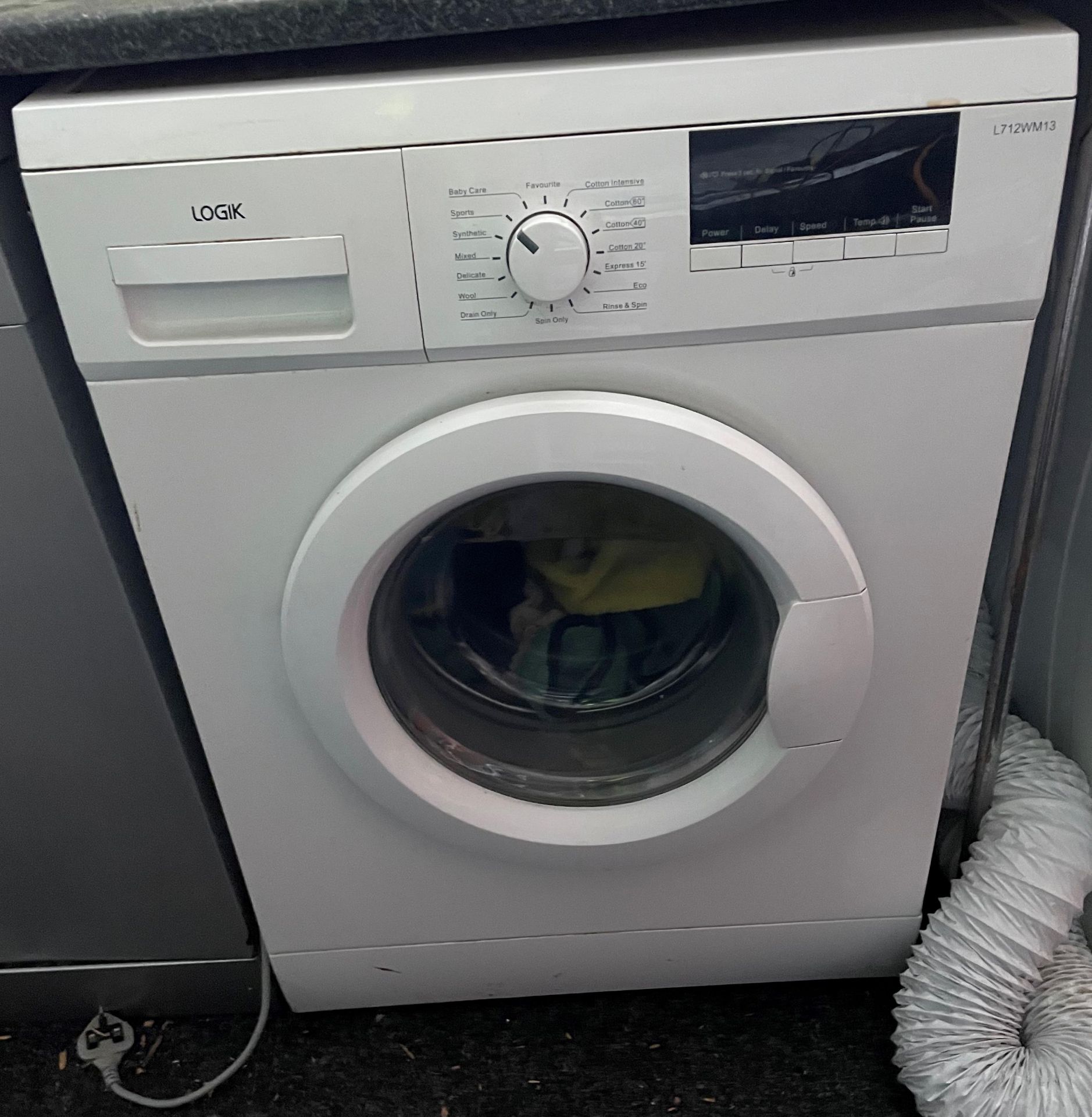 Logik L718WM13 washing machine in white (collection from TOWN END GARAGE, OSSETT,