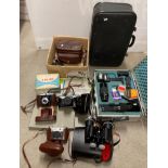 Contents to box and case - assorted camera lenses by Jivitar and assorted cameras by Nettar Zeiss,