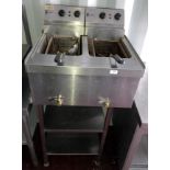 Parry twin vat electric fryer on 2-tier stainless steel stand,