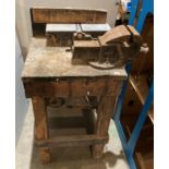 Vintage wooden joiners bench with a metal Record No 4 vice and a bench-mounted planer belt driven