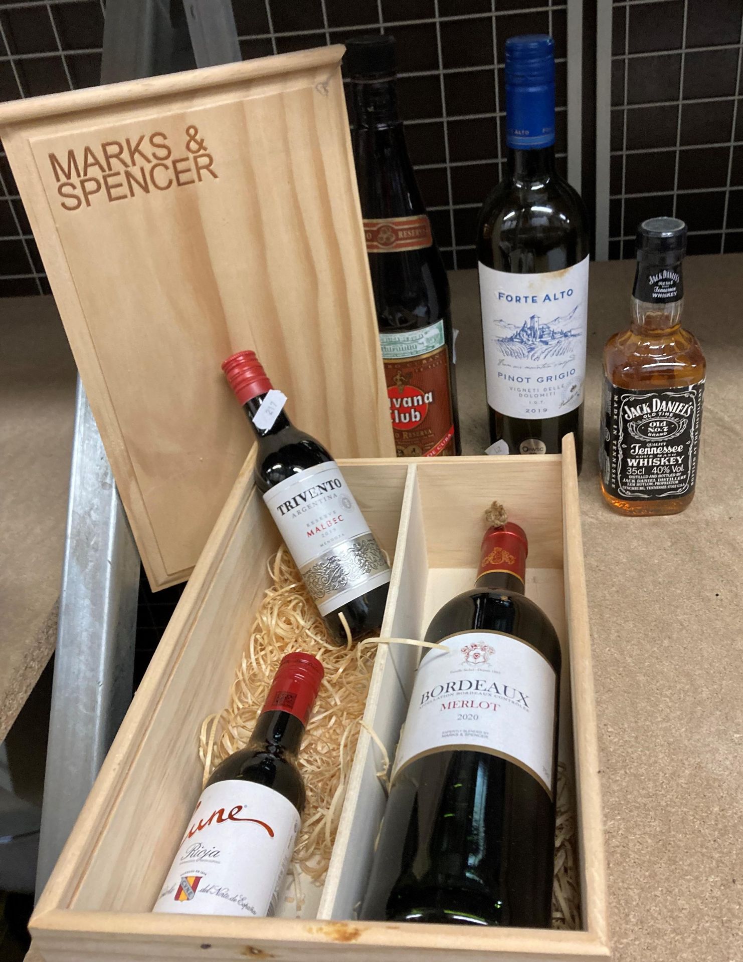 A Marks & Spencer gift set in wood box containing a 2020 bottle of Bordeaux Merlot and two 18.