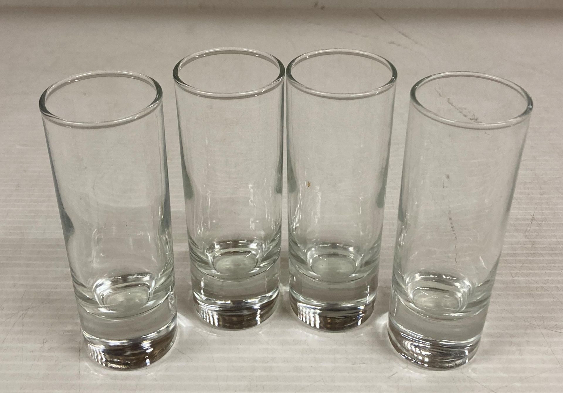 39 x Solid based shot glasses,