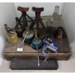 12 assorted items including a wooden vitamin Britvic box, six assorted oil can, table vice,