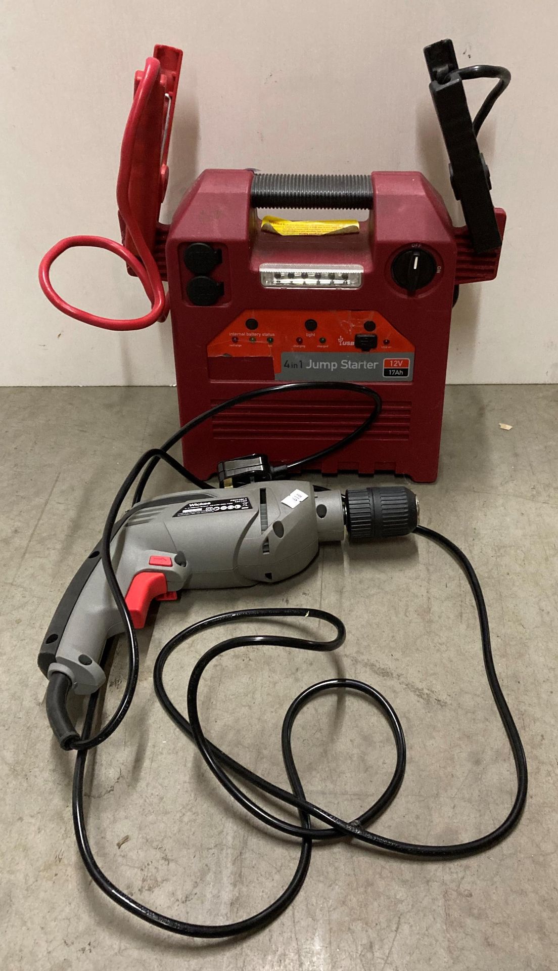 4-in-1 jump starter battery pack and a Wickes hammer-drill (240v) (saleroom location: R05-1)