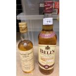 A 70cl bottle of Bell's Extra Special Old Scotch Whisky (aged 8 years - 40% vol) and a 37.