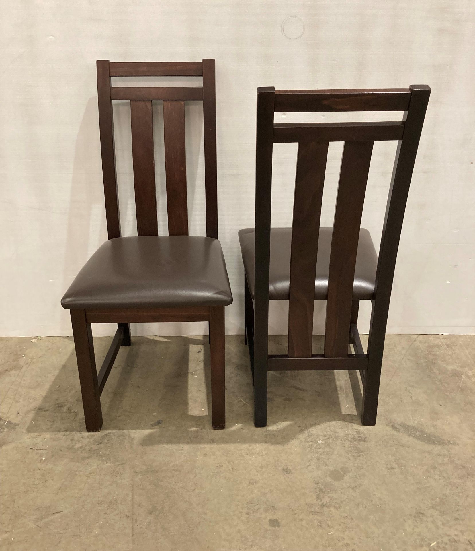 12 x Dark wood 4-rail dining chairs with brown rexine seats (saleroom location: QD04)