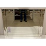 Rectangular wall mirror with solid side bevel edged side panels,