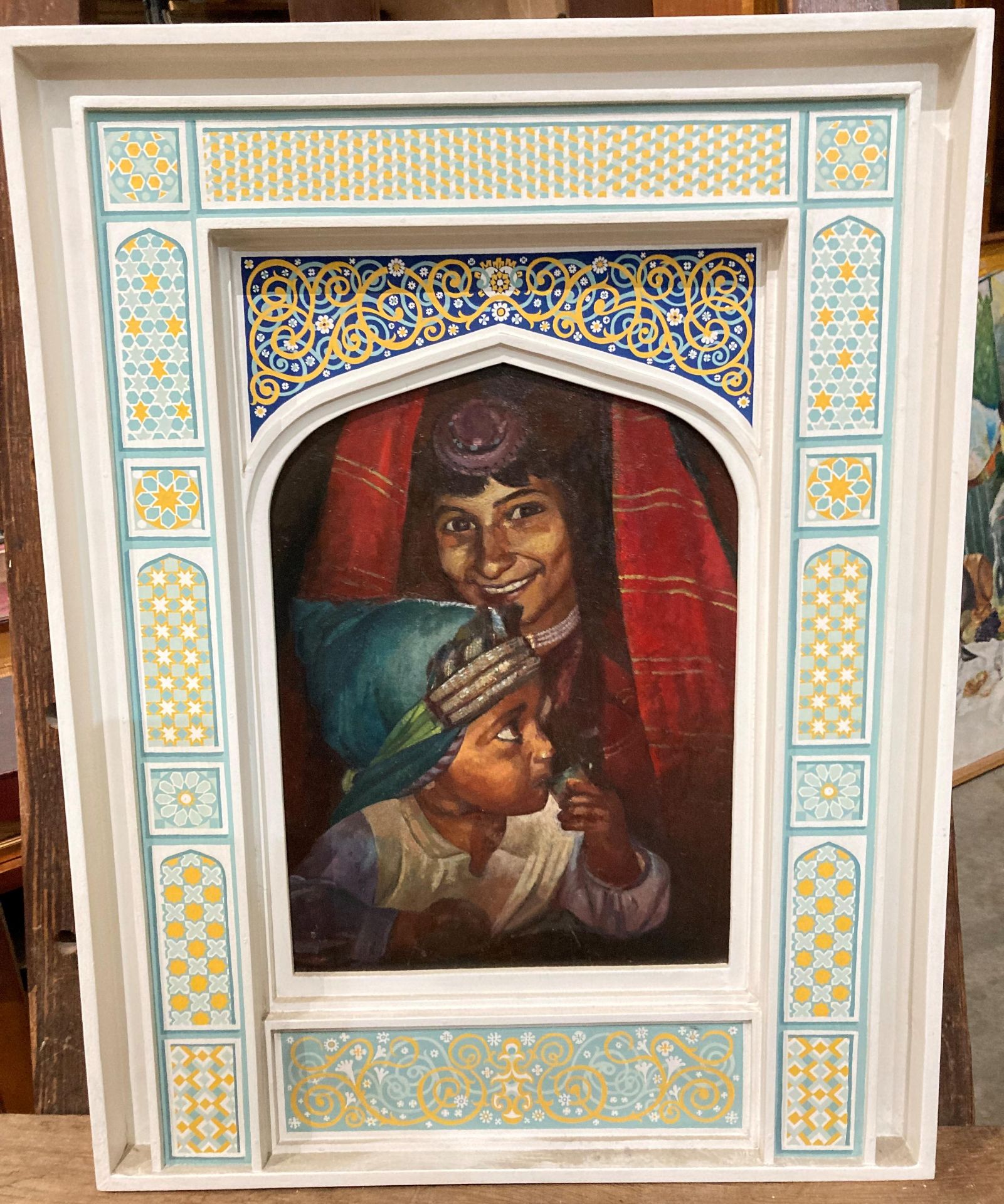 Unsigned oil on board in decorative white-painted frame, Indian woman with child,