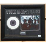 Framed limited edition white vinyl disc of Help by The Beatles, with a photo print of the group,