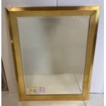 A rectangular mirror with gilt frame,