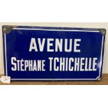 Blue and white painted enamel street sign, Avenue Stephane Tchichelle,
