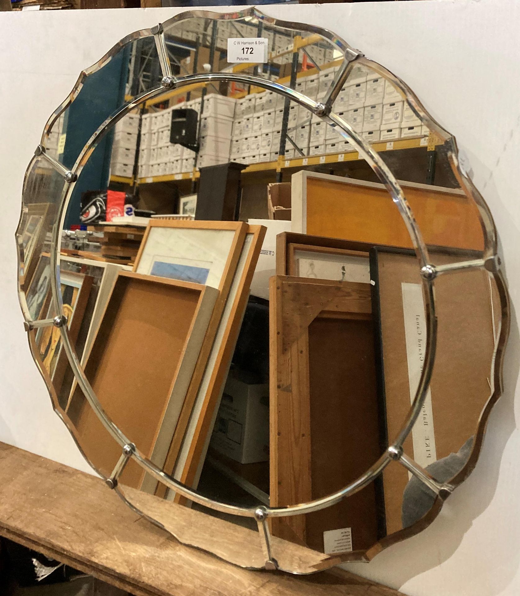 Circular Deco-style wall mirror,