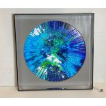 Large circular hand-finished liquid art print in frame with reflective frame,