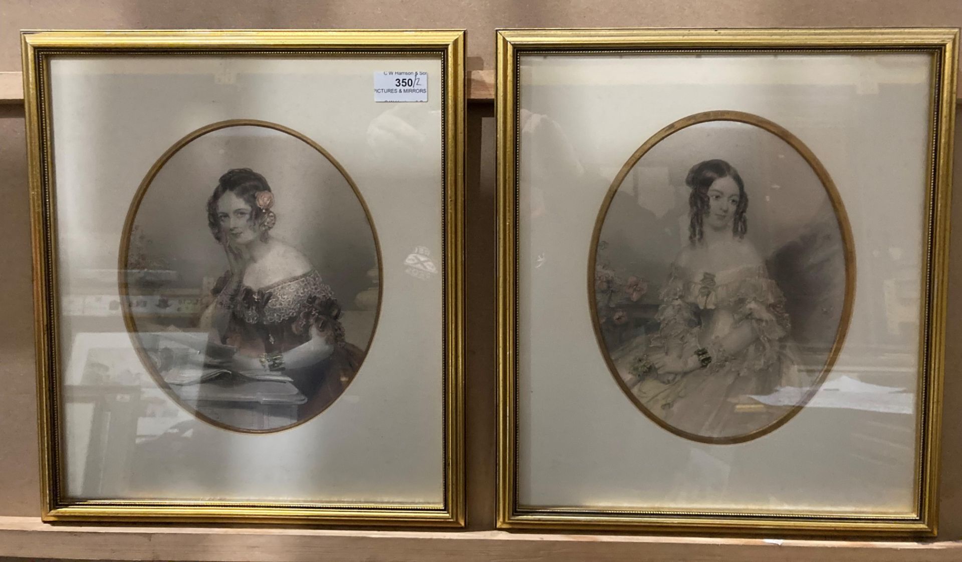 Two framed prints of Regency ladies, in oval mounts,