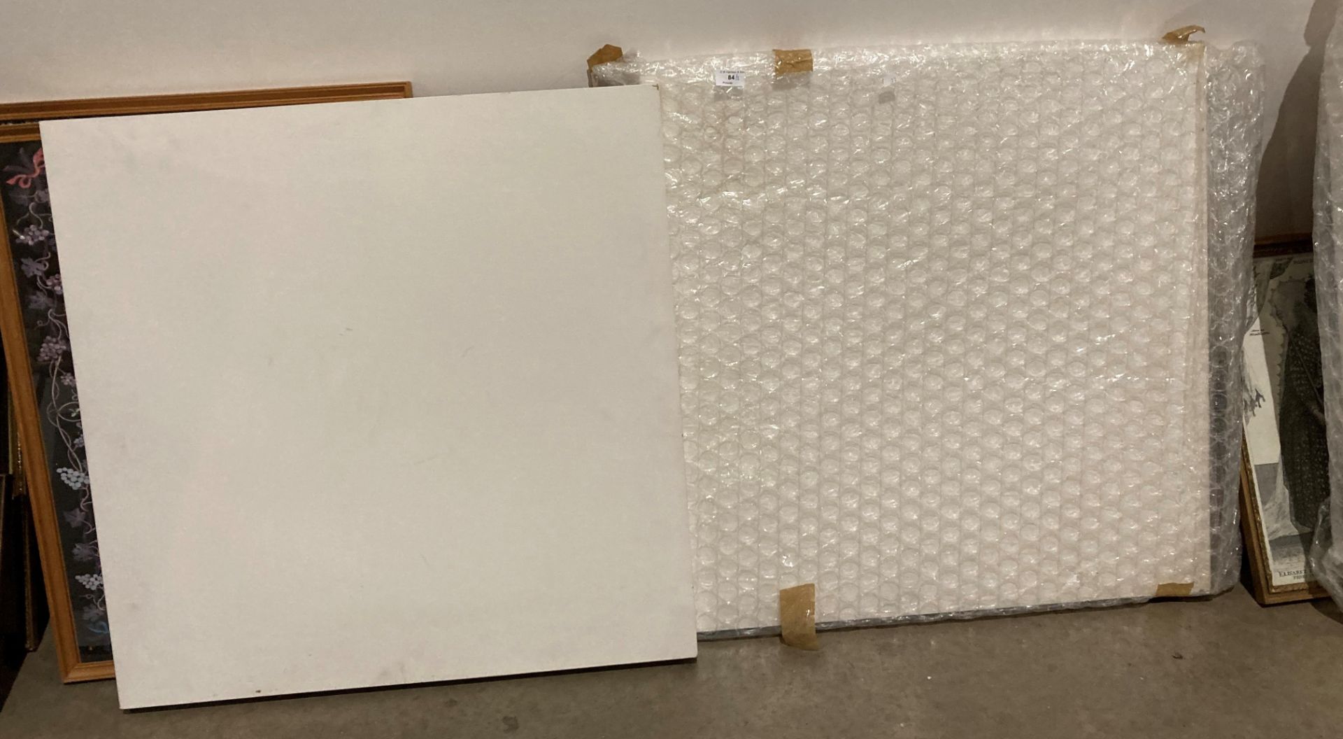 Three white block boards,