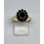 9ct gold sapphire oval cluster ring, finger size P+, gross weight 2.