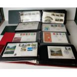 Four First Day Cover stamp albums and approximately 170 First Day Covers including Regional,
