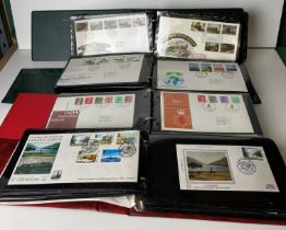 Four First Day Cover stamp albums and approximately 170 First Day Covers including Regional,